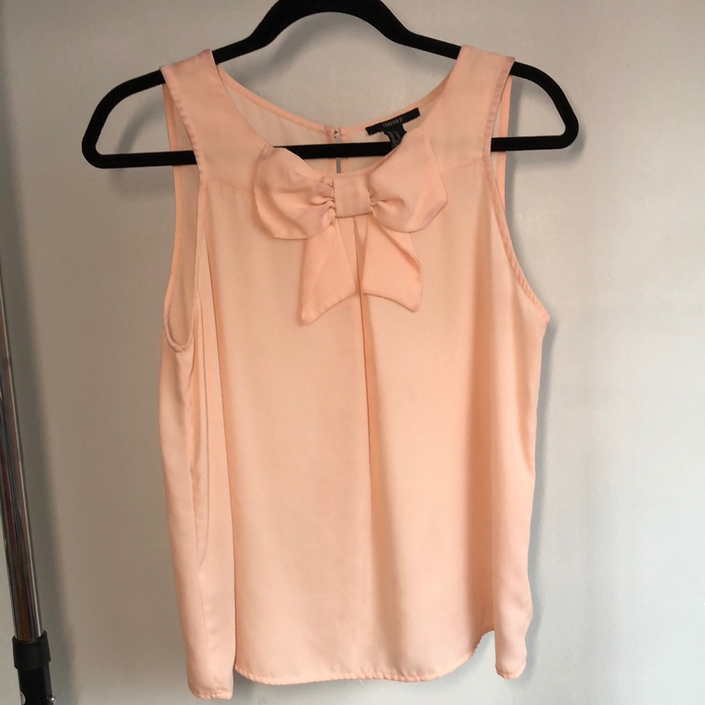 cute pink blouse with bow in front